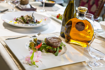 Grilled meat with vegetables served as a sandwich.
