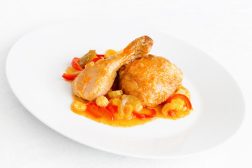 chicken leg and thigh stewed in sweet and sour sauce with vegetables and pineapple