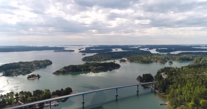 Lovon silta, Cinema 4k aerial view over the lovo bridge connecting kemionsaari and kasnas, in the finnish archipelago, in Varsinais-suomi, Finland