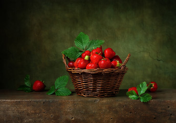 Naklejka na ściany i meble Still life with strawberries in a basket