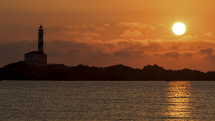 Fototapeta premium Sunrise in the lighthouse of Favaritx, Menorca