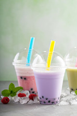 Variety of bubble tea in plastic cups