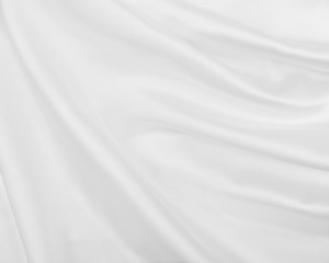 Obraz premium Gładka elegancka biała jedwabna lub satynowa luksusowa tkanina jako tło ślubne. Luksusowy projekt tła