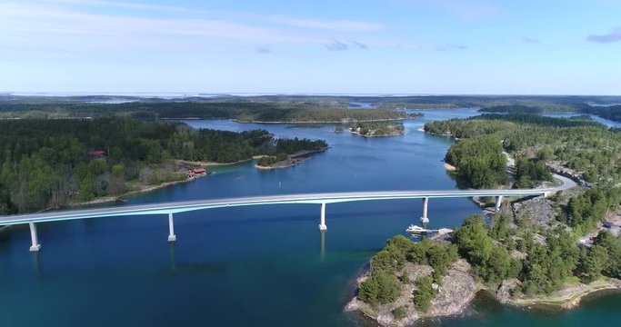 Lovon silta, Cinema 4k aerial landing view of lovo bridge, connecting kemionsaari and kasnas, in the finnish archipelago, in Varsinais-suomi, Finland