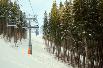 Ski lift at a ski resort in the winter in the Carpathians