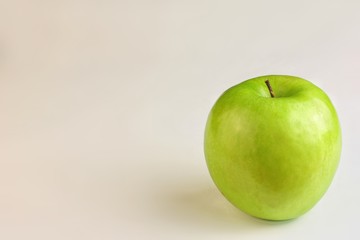 Green apple on white background