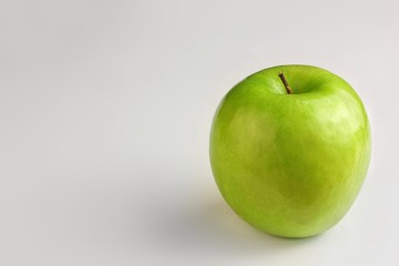 Green apple on white background