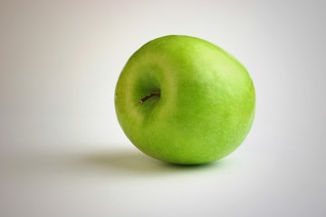 Green apple on white background