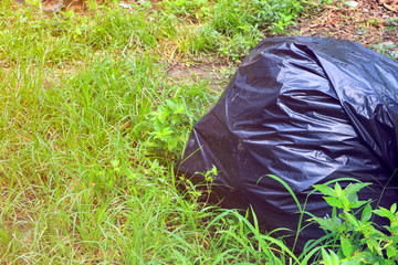 Fototapeta na wymiar garbage bag with dump in city