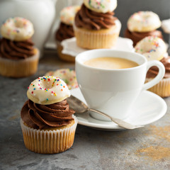 Coffee and cream cupcakes decorated with donuts