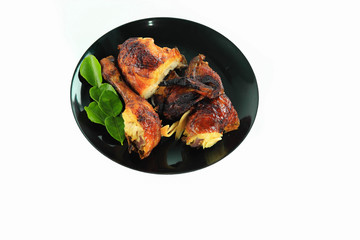 Grilled chicken with vegetables on plate