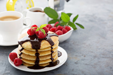 Stack of fluffy buttermilk pancakes with chocolate