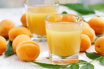 Apricot juice and ripe fresh apricots