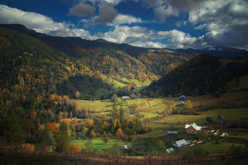 Fototapeta na wymiar Autumn in Carpathian mountains with blue sky