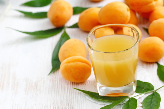 Apricot juice and ripe fresh apricots