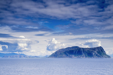 Fototapeta premium Godoy. Godoy is the southernmost and westernmost of the islands in the municipality of Giske, Norway. It is famous for its beautiful nature, dominated by the 497 meter tall mountain Storhornet.
