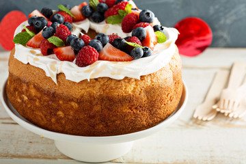 Angel food cake with whipped cream and berries