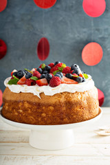Angel food cake with whipped cream and berries