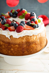 Angel food cake with whipped cream and berries
