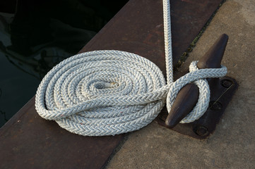 line tied neatly to cleat