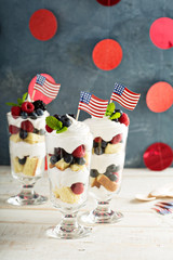 Layered dessert parfait with sweet bread and berries