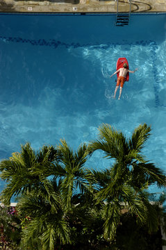 Overhead Shot Of Kid In Pool