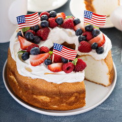 Angel food cake with whipped cream and berries