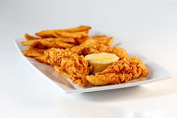 chicken fingers w/ fries and sauce