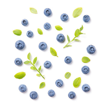 Fresh blueberries and leaves, berry ornament pattern isolated on white background, top view