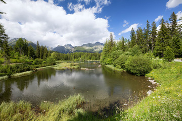 Fototapeta na wymiar Scenic lake in the high mountains / landscape