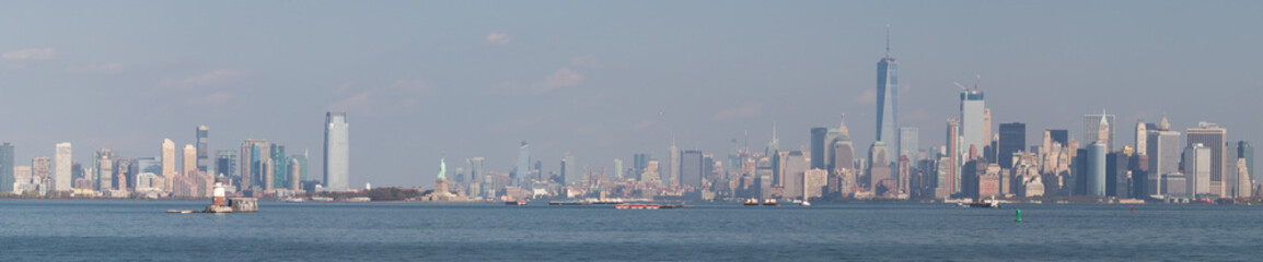 Panorama of New York Skyline with the Statue of Liberty