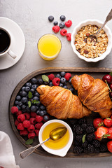 Healthy breakfast with freshly baked croissants and berries