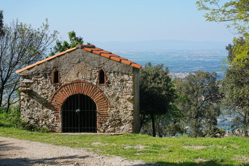 Fototapeta na wymiar Small chapel of the Christ near Sorede, Pyrenees Orientales, Roussillon, south of France