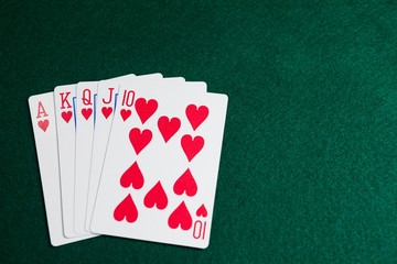 Playing cards arranged on poker table