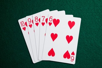 Playing cards arranged on poker table