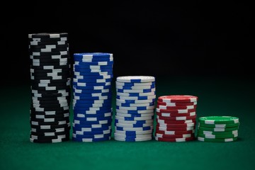 Casino chips arranged on poker table