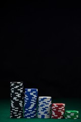 Casino chips arranged on poker table