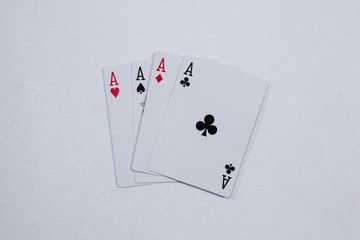 Playing cards arranged on white background