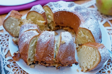 Homemade cake sliced on a plate.