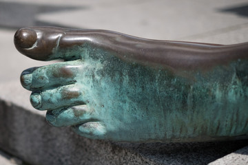 isolated foot - bronze sculpture foot closeup