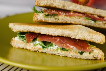 Sandwich with cheese and basil spread and carpaccio