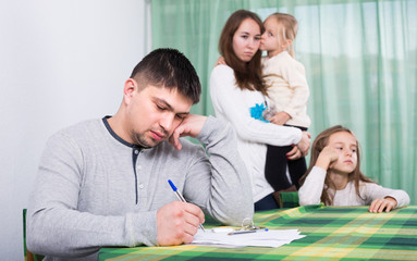 Family with kids quarreling at home.