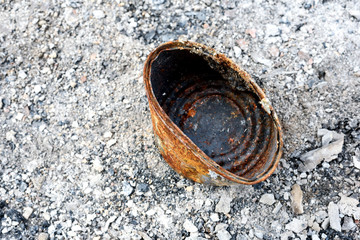 Rusty Burnt Can and Fire Ash