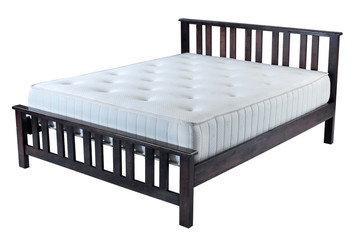 Wooden bed with mattress