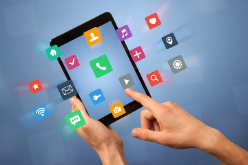 Female hand holding tablet