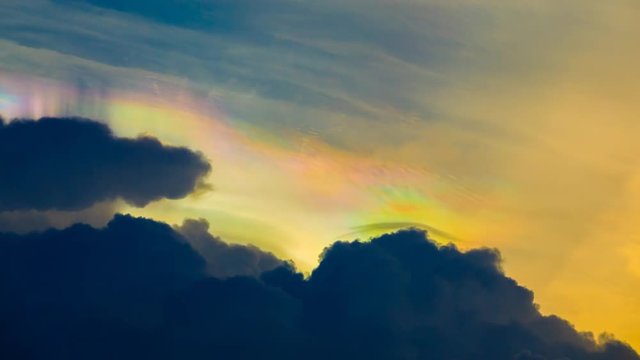 The rainbow clouds are beautifully moving, amazing phenomenon,Time lapse