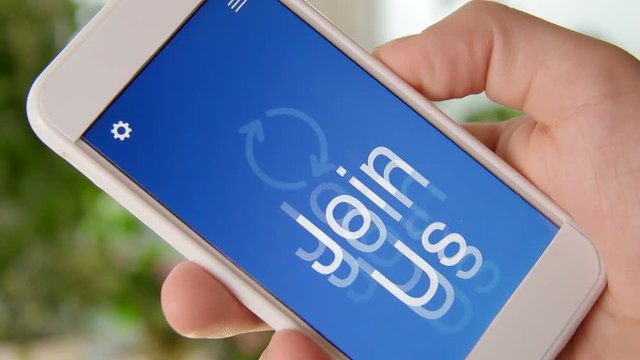 Join us concept application on the smartphone. Man uses mobile app.