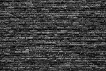 sombere achtergrond, zwarte bakstenen muur van donkere steentextuur