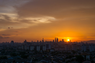 Naklejka premium View of majestic sunset over downtown Kuala Lumpur, Malaysia