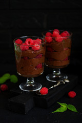 Chocolate mousse with raspberries. Selective focus.
